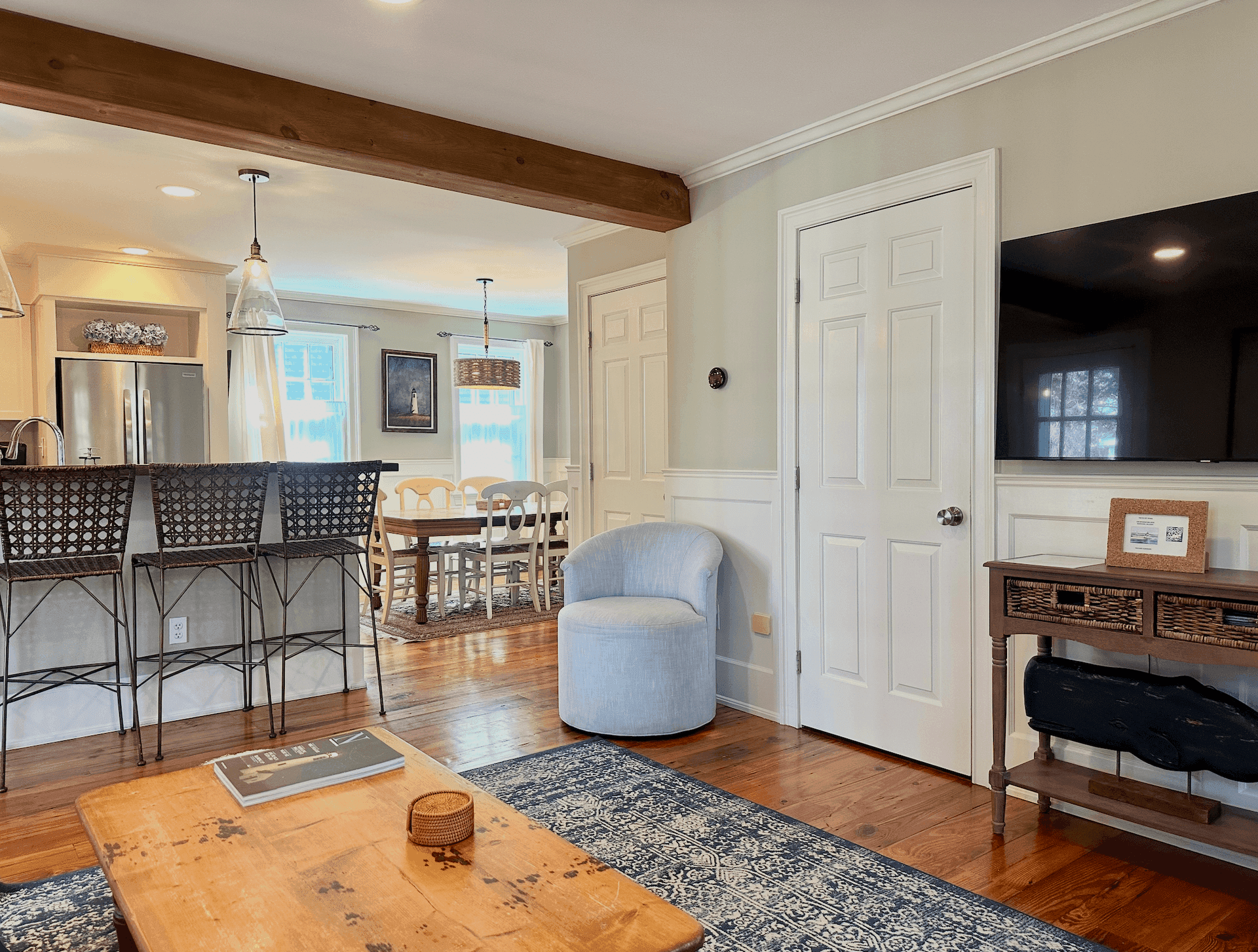 Living and dining rooms looking toward the kitchen